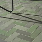 Green tile on outdoor flooring.