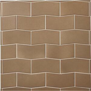 Yosemite from Pure by Sonoma Tilemakers Closeup of light brown wall tile in a geometric arrow shape.