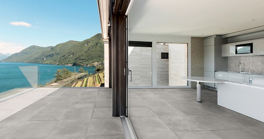 Seaside outdoor entertaining area with porcelain tile finish