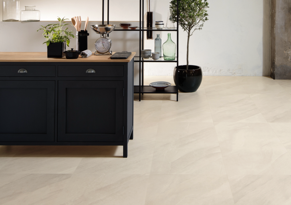 light colored vinyl flooring with modern black desk and black shelf with plants
