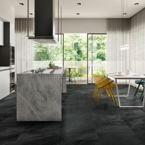 Contrasting black, gray, and white tiles make a bright room POP