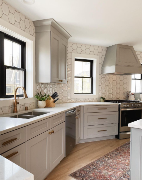 White hexagonal kitchen tile backsplash