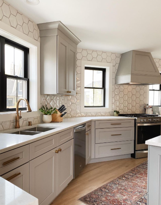 White hexagonal kitchen tile backsplash
