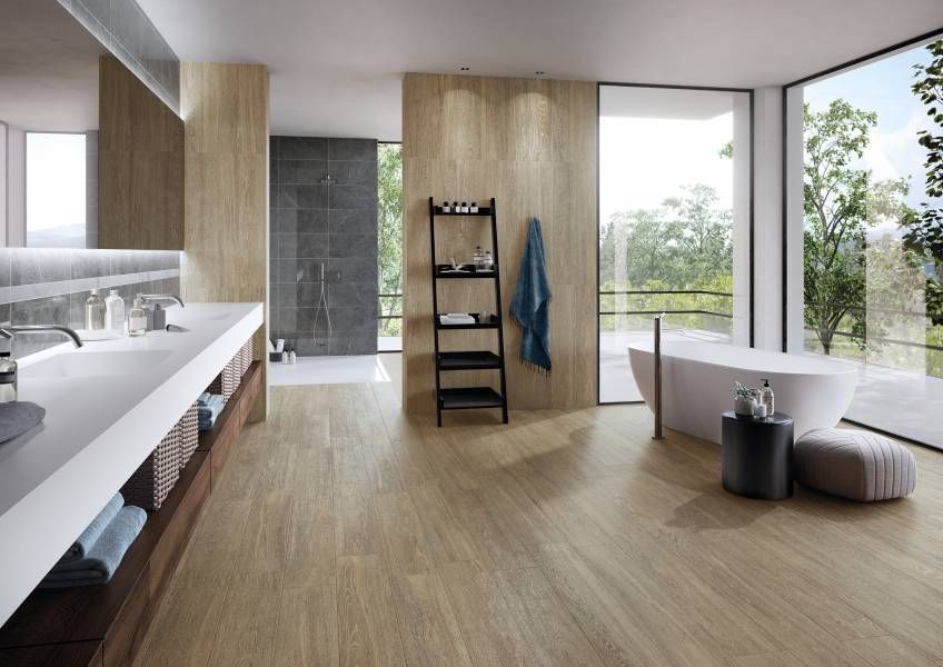 Wood look tile in bathroom space.