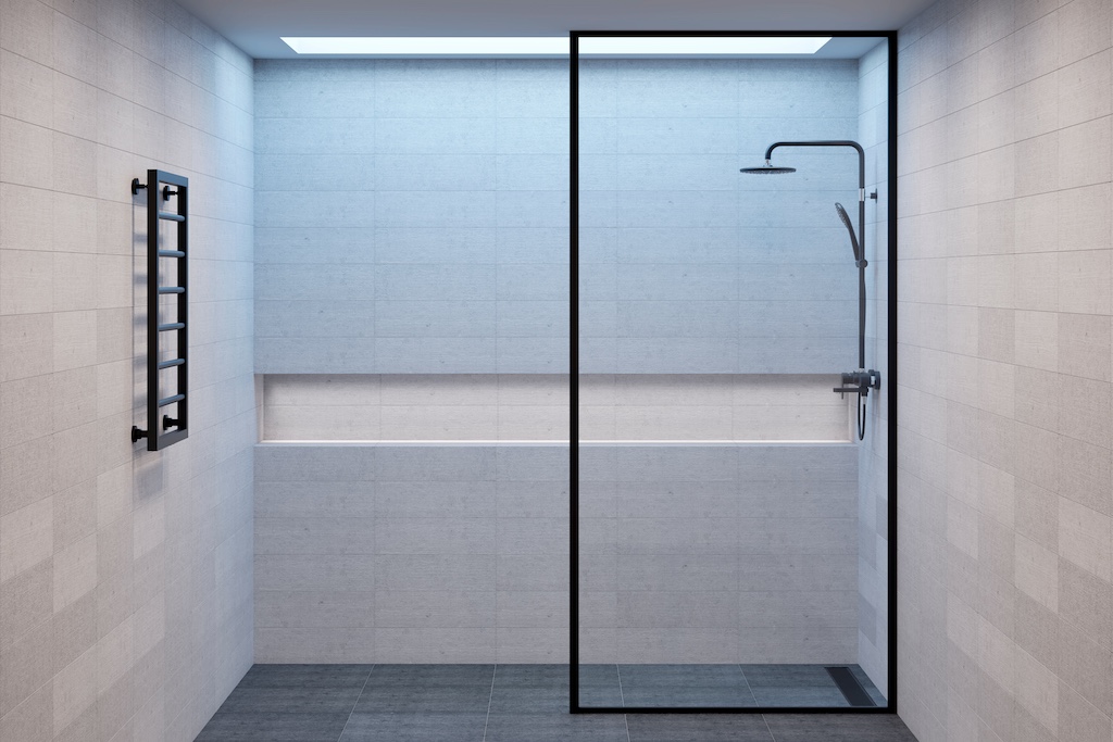 Bullnose tile in shower wall to hold shampoo and conditioner.