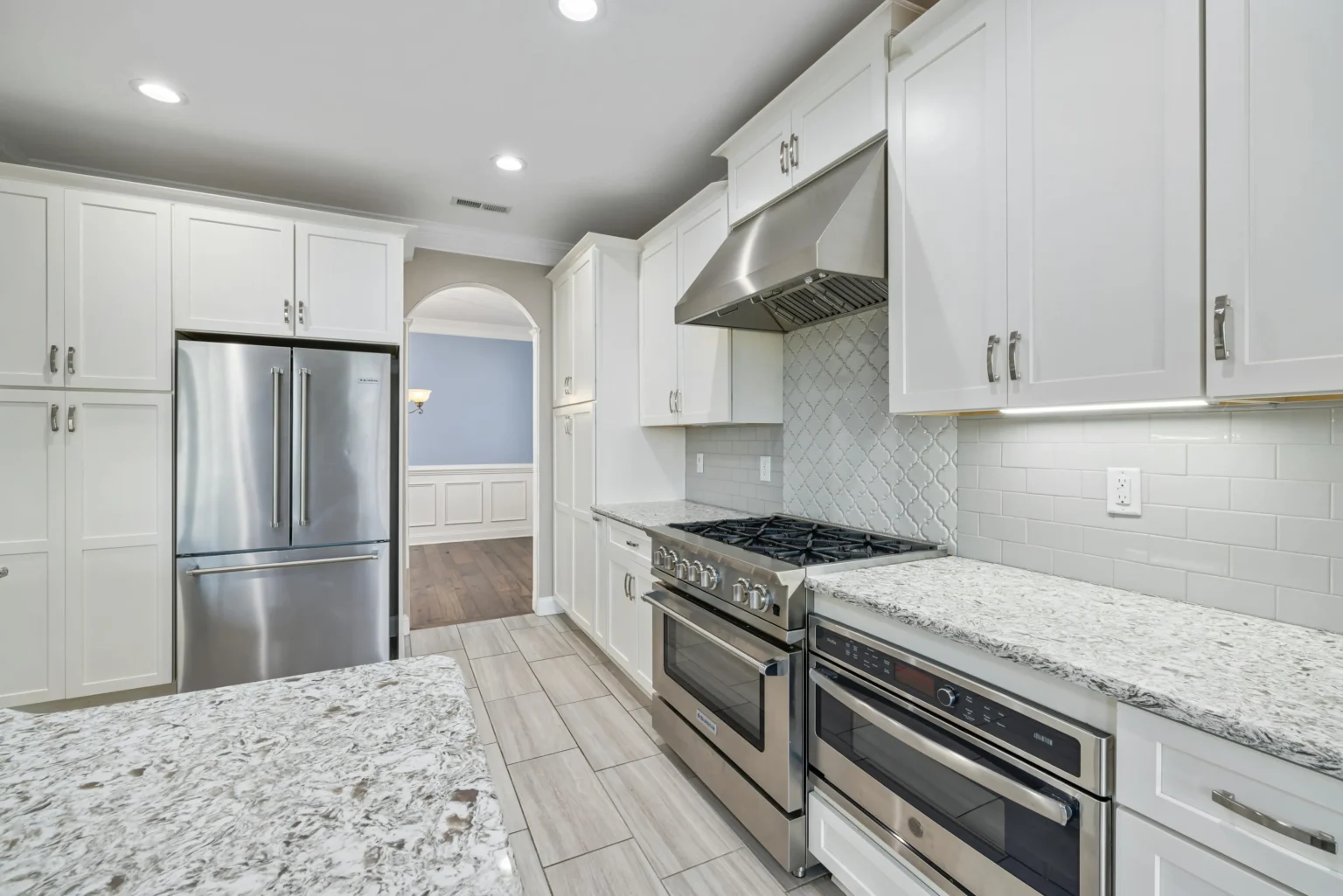 Modern kitchen with tile floors and backsplash