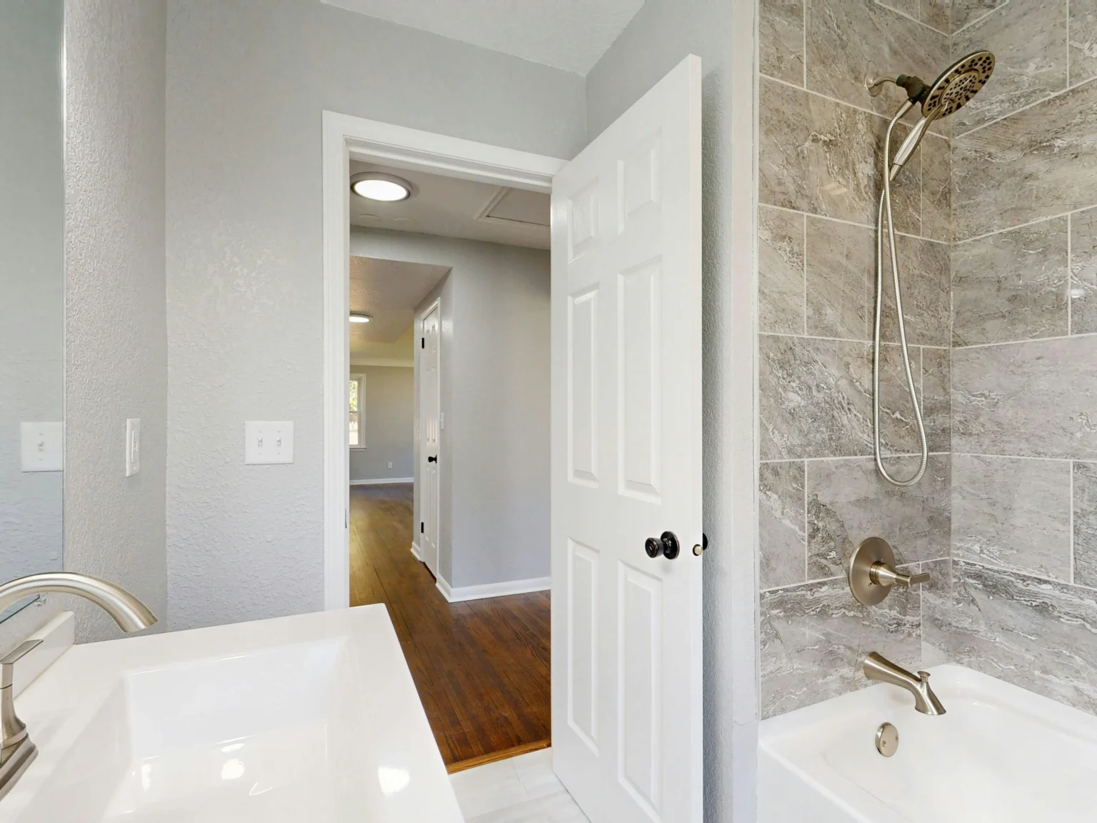 Modern bathroom with white tile shower